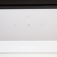 The minimalist controls on top look just like those on the Sonos One.